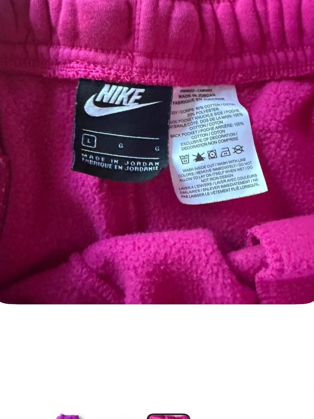 Nike men’s bright pink sweatshorts w/white Swoosh, back pocket, 2 side pockets